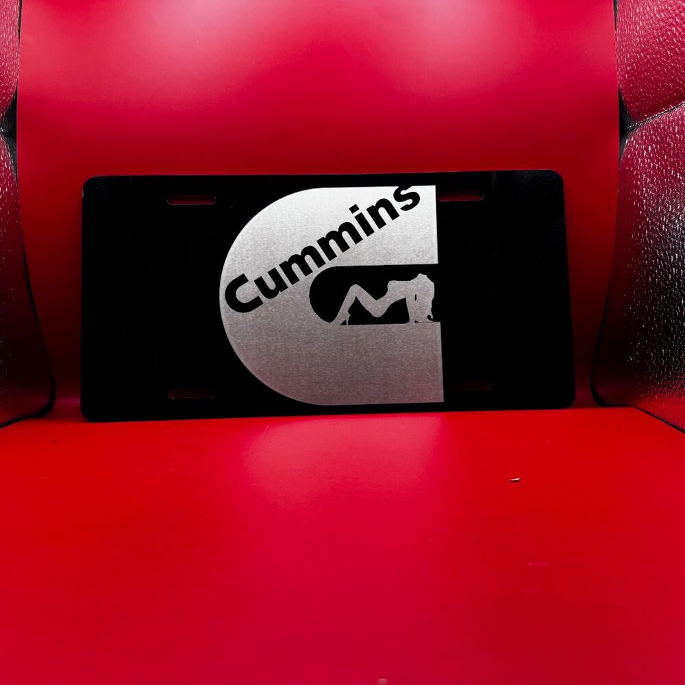 Black laser engraved Cummins License Plate with girl